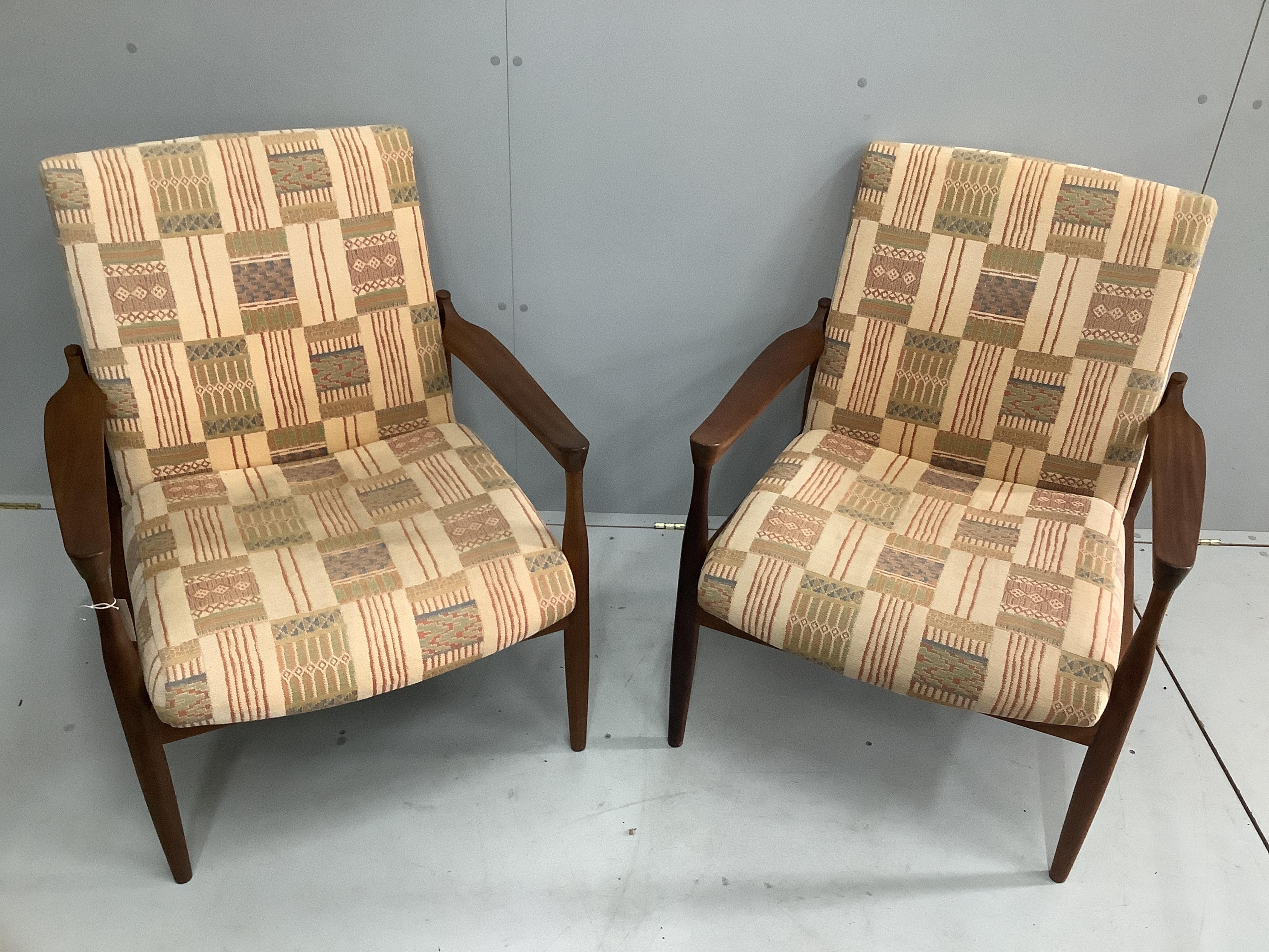 I.B. Kofod Larsen for G-Plan, a pair of mid century Danish design teak armchairs, width 69cm, depth 70cm, height 82cm. Condition - good